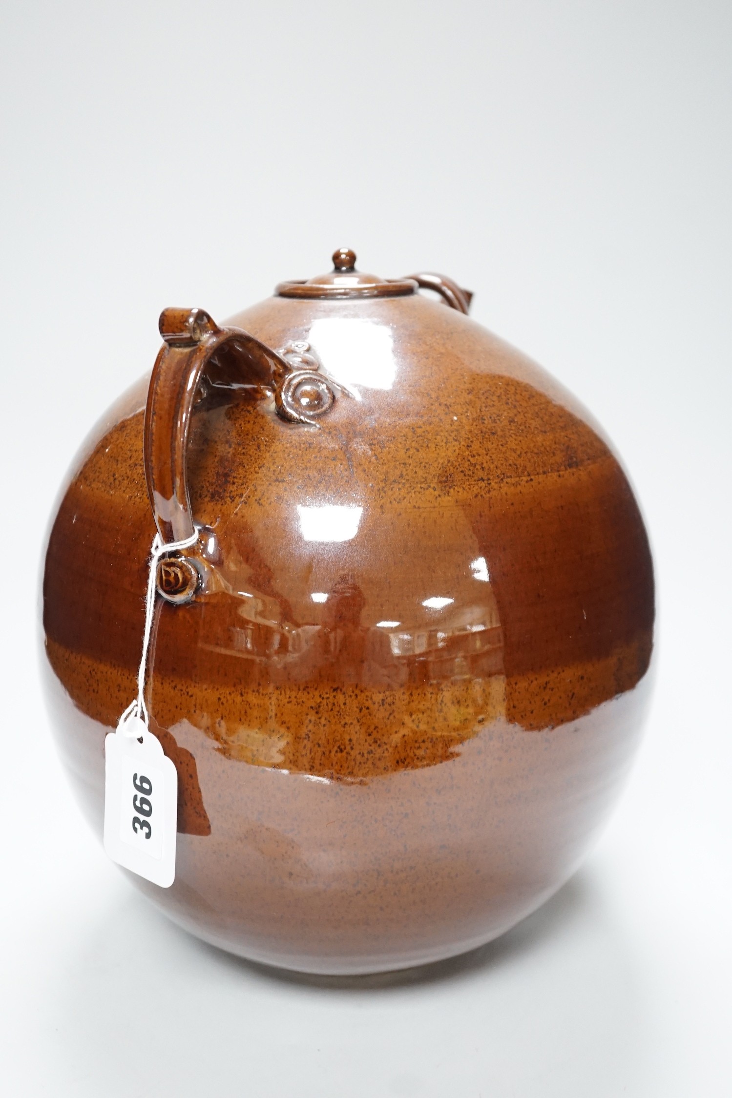 A Doug Bignell 'Alice in Wonderland' brown glazed teapot (a unique piece commissioned by the current owner), 30cms
